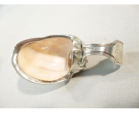 SMALL WHITE METAL CADDY SPOON/SCOOP ENCAPSULATING A SEA SHELL SECTION, ML MARK(MATTHEW LINWOOD, BIRMINGHAM) WITH INSCRIPTION 