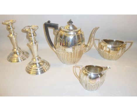 PAIR OF SILVER PLATED CANDLESTICKS, SILVER PLATED TEAPOT, SUGAR BOWL AND JUG ALL WITH 'S' ENGRAVED ON THE SIDE [5]