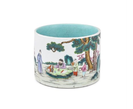 A Famille Rose enamelled porcelain brush pot, Qing Dynasty, of broad cylindrical form with straight sides, painted around the