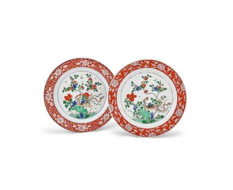 Two Chinese Famille Verte plates, Kangxi (1662-1722), the central panels depicting a phoenix, the border with a continuous ro