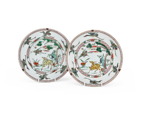 A pair of Chinese Famille Verte 'Deer and Crane' plates, Kangxi (1662-1722), decorated with a prancing deer under a pine tree