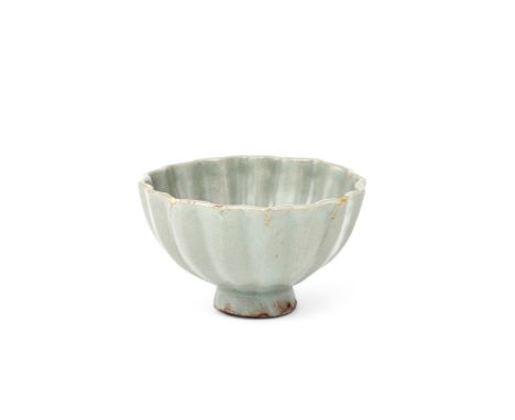 A Chinese longquan celadon lobed bowl, Sothern Song Dynasty (1127-1279), delicately potted with rounded, vertically-lobed sid