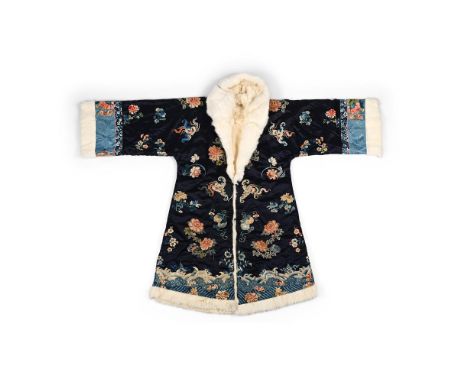 A Chinese Han ladies midnight-blue silk front opening semi-formal robe, Qing dynasty, mid 19th century, lined with white fur 