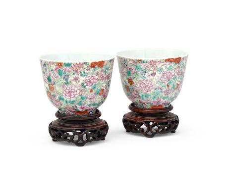 A pair of Chinese Famille Rose 'Mille Fleur' cups, 19th century, of deep 'U' form with slightly flaring sides rising from a s