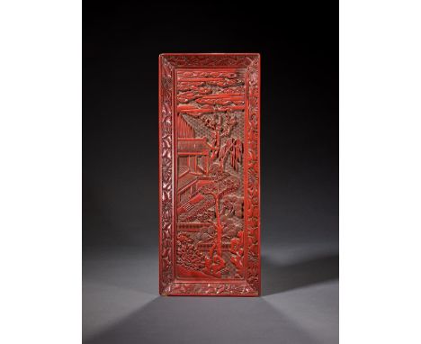 A Chinese carved cinnabar lacquer rectangular scroll tray, Qing dynasty, 17th-18th century, the interior with terraced buildi