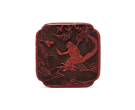 A Chinese cinnabar lacquer 'Dragon and Luohan' box and cover, 17th or 18th century, the top of the cover intricately carved t