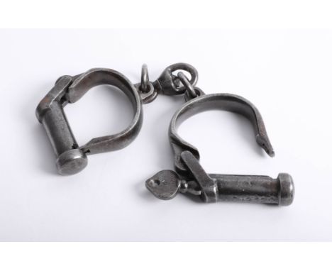 A pair of vintage handcuffs with key marked KE 2770, J.G.1952.