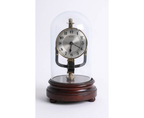 An 800 day clock (electric) under dome, height 28cm.