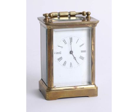 A small brass carriage clock, 11cm.