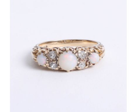 A 9ct opal and diamond seven stone ring.