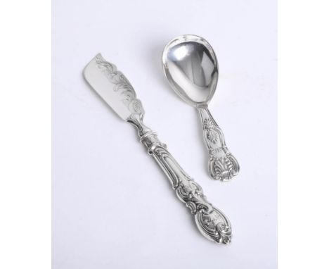 A silver caddy spoon and a butter knife (2).