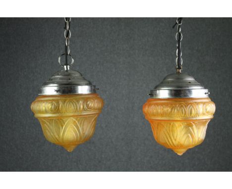 A pair of Art Deco amber glass ceiling light pendants. H.35 Dia.25cm. (each). 