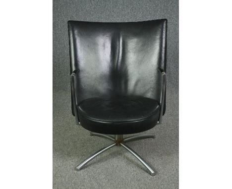 A vintage Erik Jorgensen EJ70 partner chair in leather and chrome, designed by Johannes Foersom and Peter Hiort-Lorenzen. H.8