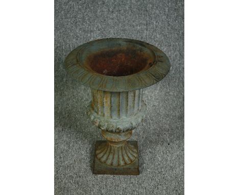A 19th century style metal garden planter of campana form. H.38 W.30cm. 