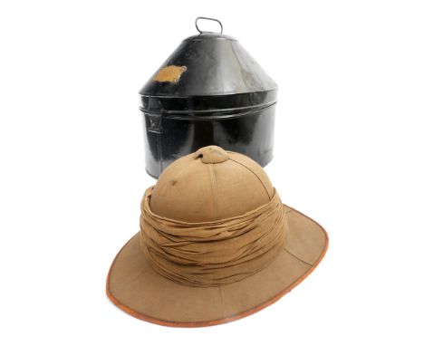 Royal Dublin Fusiliers helmet case and a Wolseley-pattern sun helmet. The metal travel case painted black and with late 19th 