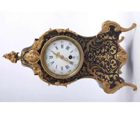 French boulle bracket clock. An ormolu-mounted, boulle bracket clock, of waisted form, the white enamel dial with Roman and A