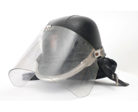 Royal Ulster Constabulary riot helmet A black RUC 'Skulgarde' helmet with decal RUC badge and visor. Reputed to have been wor