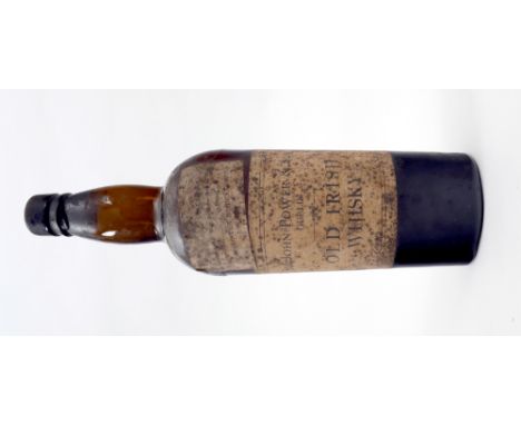 1918-19 Sir John Power and Sons, Old Irish Whiskey. Bearing a War Revenue Act, 1918 label for The Mohican Hotel. Built in 189