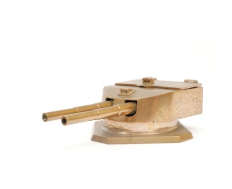 Battleship Gun Turret inkwell. A brass inkwell in the form of a naval gun turret, stamped 'Cast from metal ex-surrendered Ger