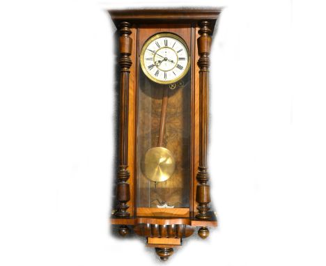Walnut cased Vienna wall clock, ivorine dial, double-weight driven movement by Gustav Becker, architectural case, with an eag