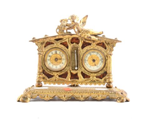 An early 20th Century French gilt metal table clock barometer and thermometer, 21cm.