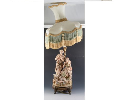 Royal Dux table lamp, modelled with shepherd and shepherdess musicians, gilt metal mounts with shade 91cm.