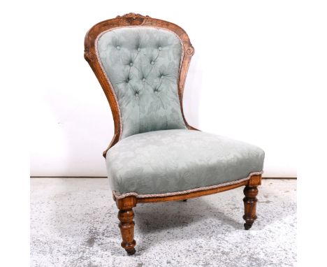 Victorian easy chair, hoop-back, button dralon upholstery, serpentine seat, carved scrolled arms, turned legs on castors, 59c