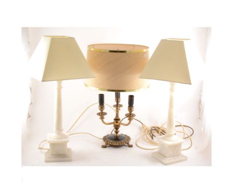 A pair of alabaster 'column' table lamps, 57cm, and excluding fitments; and a French style brass bouillotte table lamp. (Qty: