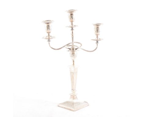 An Elkington &amp; Co three-light candelabra, tapered reeded column, removable arm and sconces, 41.5cm.