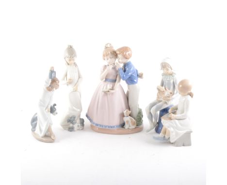 A Nao figure of a Pierrot, 20cm; a Nao figure of Harlequin; five other Nao figures; and three other Spanish figurines. (Qty: 