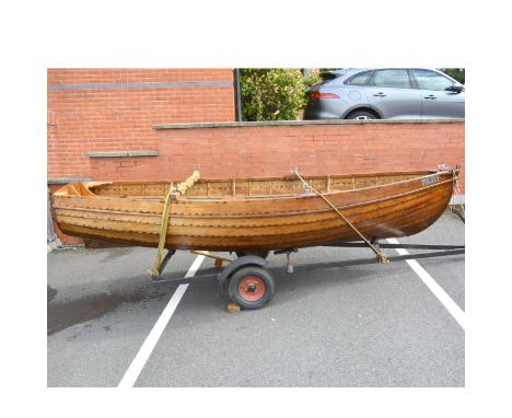 12ft Clinker Dinghy, "Tejay", built by Elton Boats, Derby, on trailer, with British Seagull outboard motor, 40+, engine # FP5