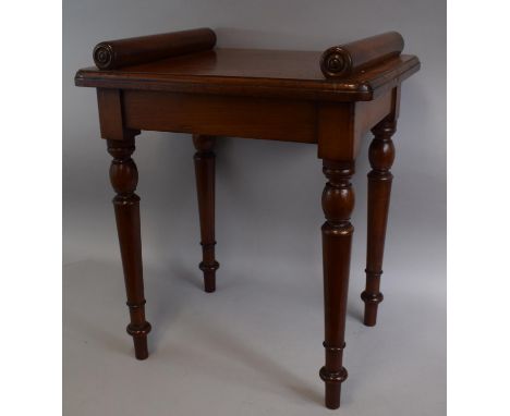 An Early 19th Century Mahogany Hall Bench of Unusual Diminutive Size, the Solid Top with Turned Bolster Ends, Supported on Tu