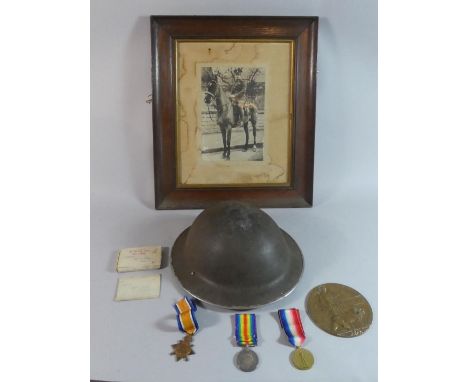 A WWI Death Plaque for Private T Wiggin, Gordon Highlanders S-11115 Together with His Medals, Helmet and Framed Photograph Al