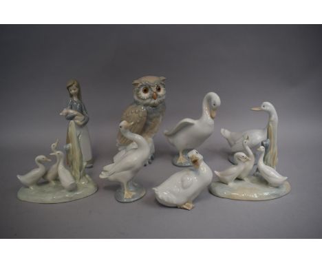 A Collection of Eight Lladro and Nao Ornaments to Include Girl with Pig, Owl, Ducks etc 