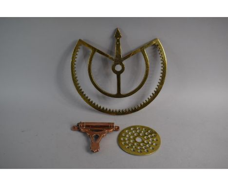 A 19th Century Brass Cog Driven Arrow Pointer, A GWR Copper Door Bracket and a Pierced Brass Disc (Pointer 30cm Diameter)