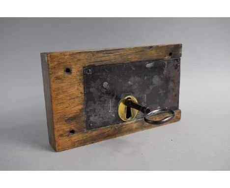 A Georgian Brass Mounted Iron Door Lock in Wooden Surround with Key and Working, 25cm Wide 