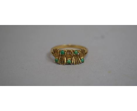 A 1970s 9ct Gold Ring with Jade Stones Mounted on Stylized Crowns. Import Mark for London. 2.7gms 