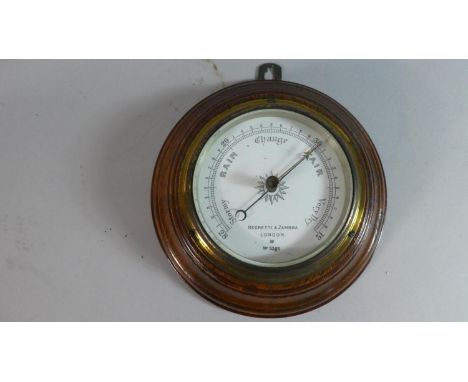 An Edwardian Circular Oak Framed Aneroid Barometer by Negretti &amp; Zambra, No.5366 