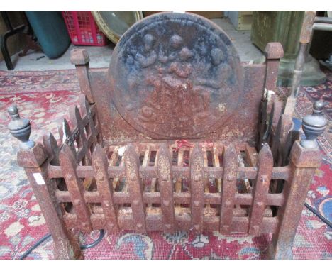 A late 19th/early 20th century cast iron fire grate with circular back boardLocation: G 