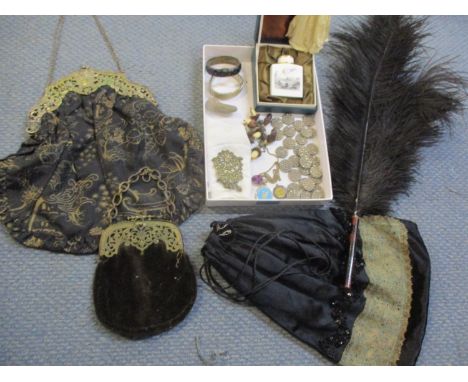 A continental 1920's evening bag with silver clasp (marked 800), two other evening bags, a black ostrich feather fan with tre