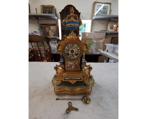 A late 19th/early 20th century French gilt metal and porcelain mantle clock on gilt wood stand, 37 h x 25 w x 12cm dLocation: