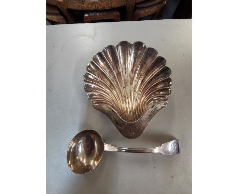 A Georgian silver sauce ladle together with a silver butter dish of shell form, 139gLocation: Porter 