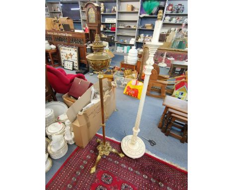 A Victorian brass oil standard lamp converted to electric together with a cream modern lampCondition: rewiring required Locat