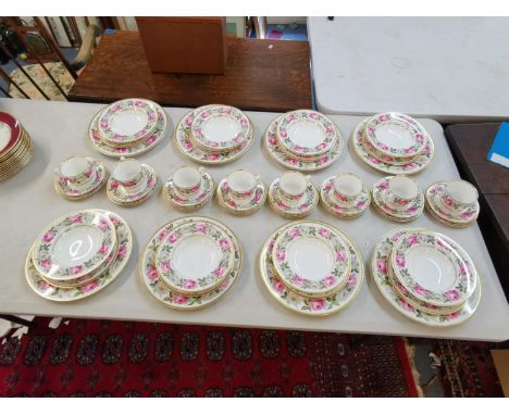 A Royal Worcester porcelain service for eight with Royal Garden pattern to include eight dinner plates, eight side plates, ei
