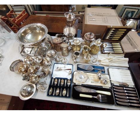 Silver plate to include cased sets, punch bowl, wine coaster, tea strainers together with a pierced white metal dish, a white