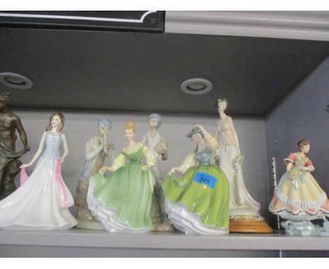 Three Royal Doulton figures of ladies in costume together with two Cascades figures of young men, a Royal Worcester figure en