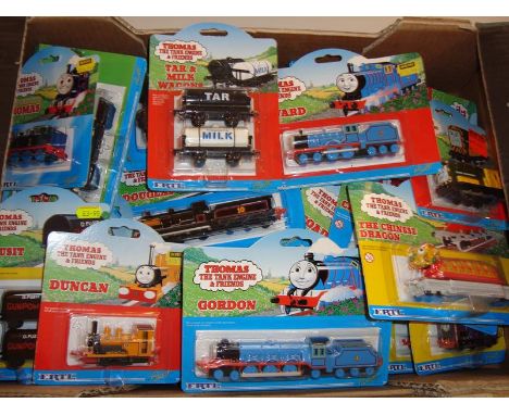 A large quantity of Thomas the Tank Engine locos, track, wagons and accessories, mostly by Ertl - VG-E in G boxes (Q)