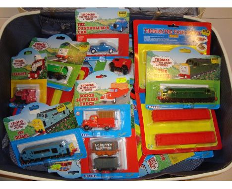 A large quantity of Thomas the Tank Engine locos, track, wagons and accessories, mostly by Ertl- VG-E in G boxes (Q)