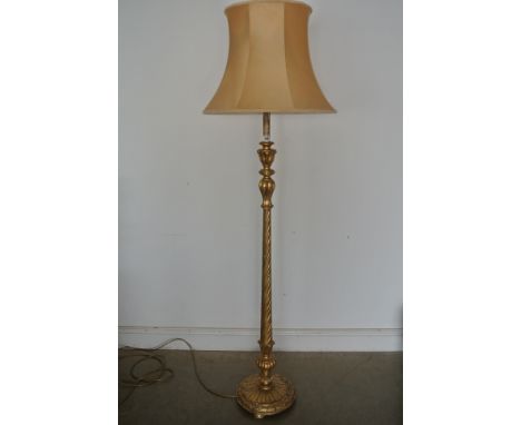 A giltwood standard lamp with shade - Height 184cm 