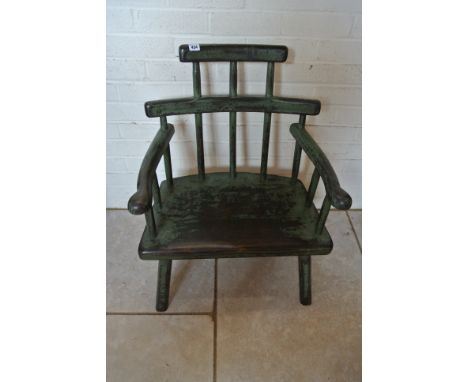 A painted comb back Windsor low arm chair - Height 76cm x 59cm x Depth 40cm 